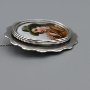 Oval plaque brooch with flutist and dog - Image 5